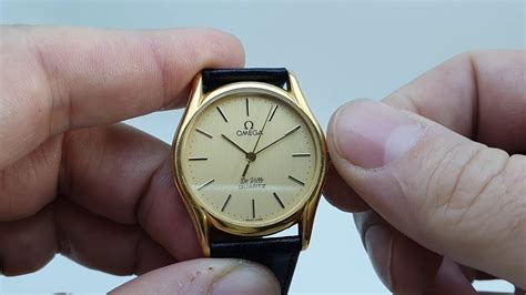 how to change time on omega watch